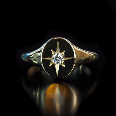 Yellow Gold Signet Ring with an 8 point star set Diamond
